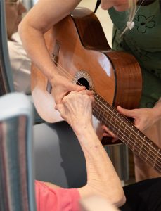 Music Therapy featuring guitar